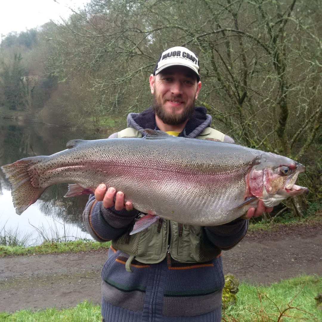 Kevin Keast holding his 18lbs-6oz rainbow trout